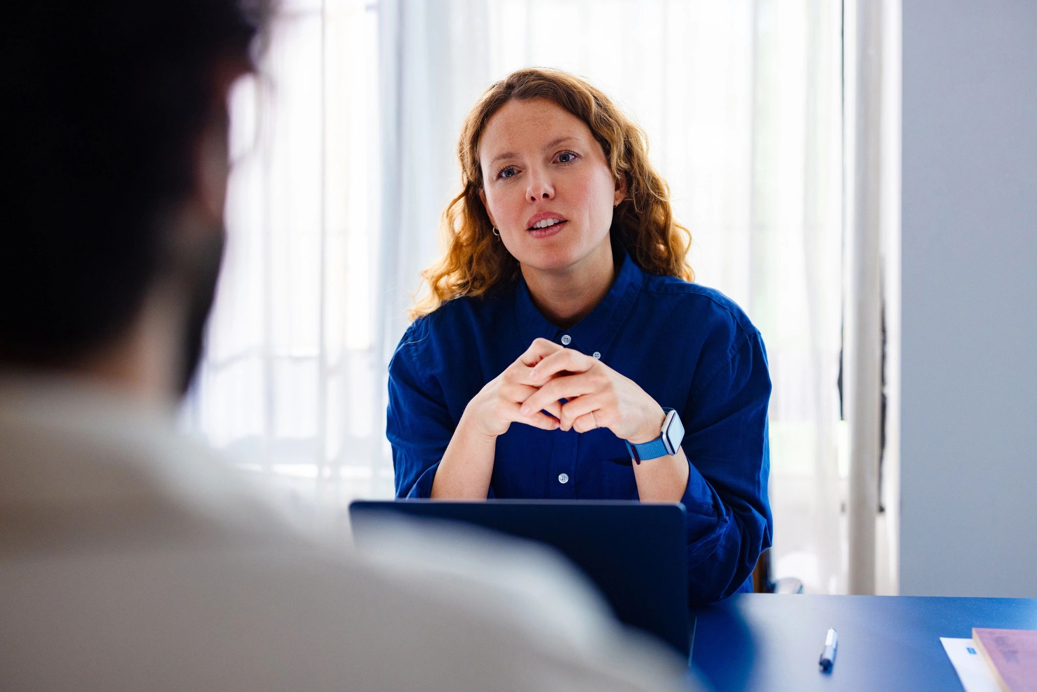 Consultant meeting with a client to discuss sustainability strategy